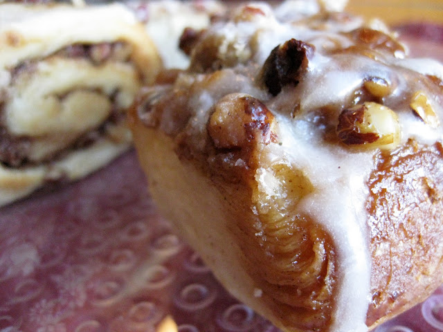 gooey cinnamon buns with hazelnuts and icing