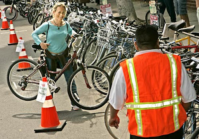 Image of bicyclist at valet bike parking in Santa Monica