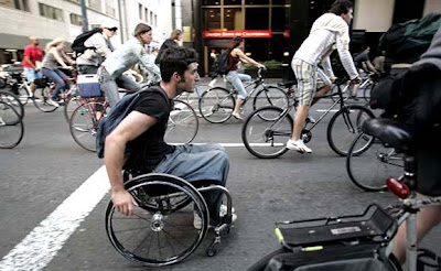 Image of man in wheelchair participating in San Francisco's Critical Mass in April 2007