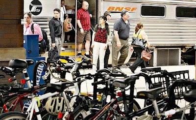 Image of crowded bike rack at Metra station