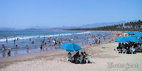 Mexican families enjoying the beach Playa Linda