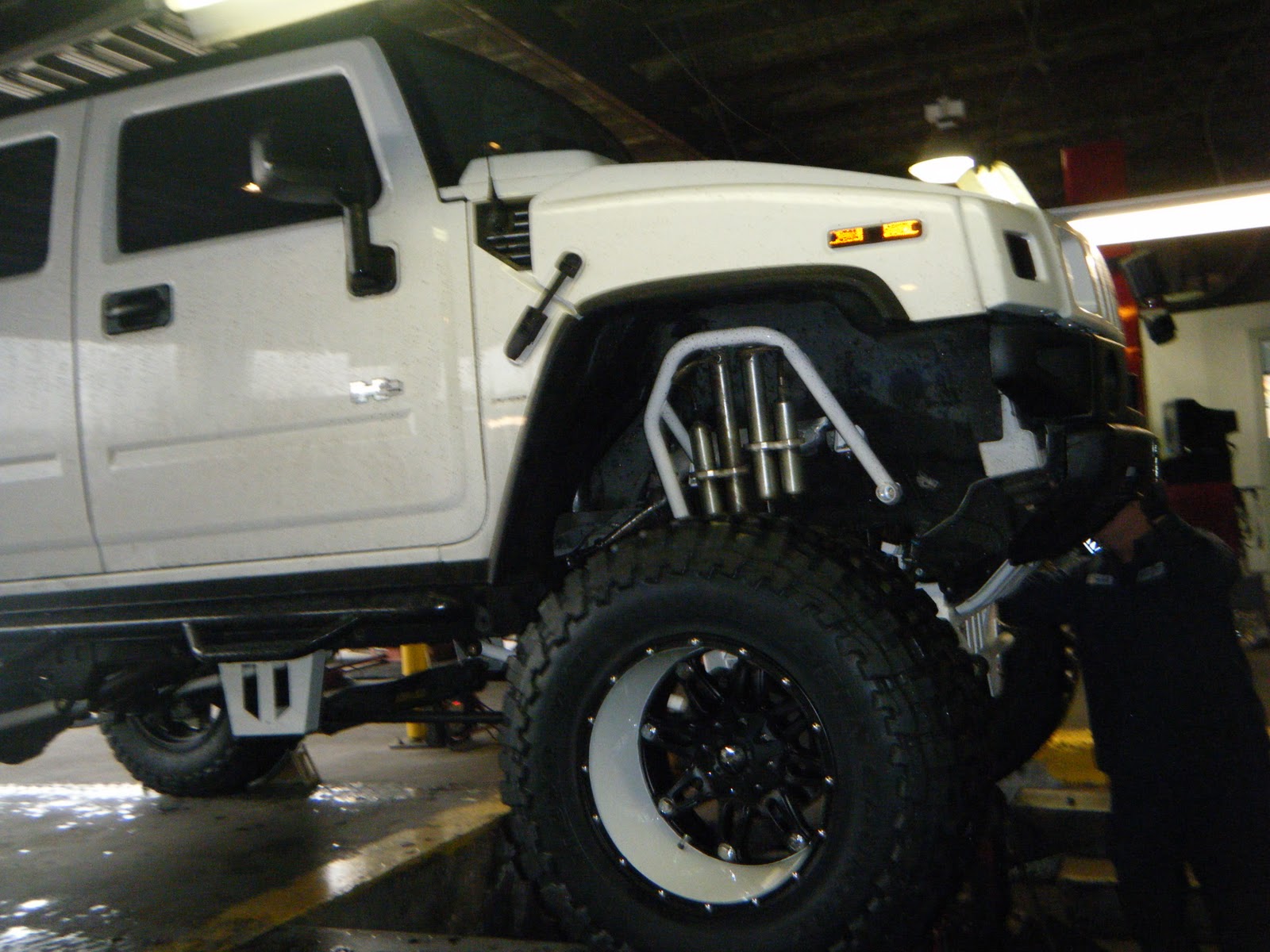 Axle and Wheel One big lifted Hummer!