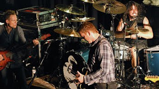 them crooked vultures band on stage