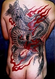 Tribal Dragon Sleeve Tattoo