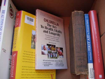 Book in a box, with cover reading Chlorella, etc.