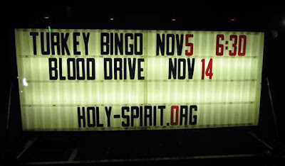 Lit church sign reading Turkey Bingo Blood Drive