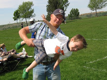 Uncle Casey helping Tyson with his flying skills
