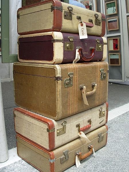 deluxa: Stacks of Vintage Suitcases