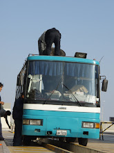 Customs checking our bus going into Peru