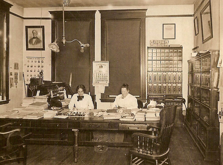 [1914_Office_with_Two_Women_at_Desk.jpg]
