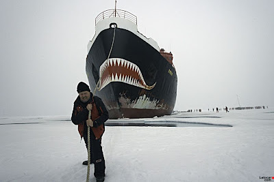 picture of a ship with shark teeth painted on the bow