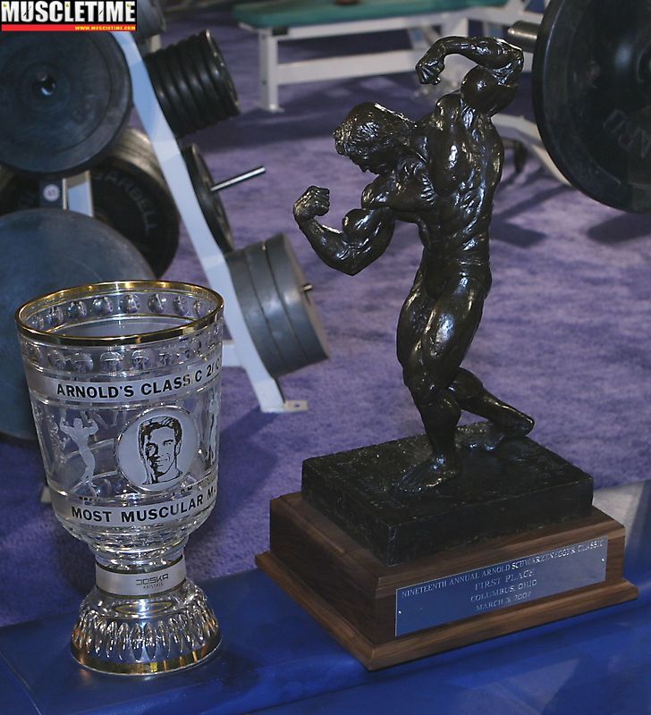 Mr. Olympia Sandow trophy. 