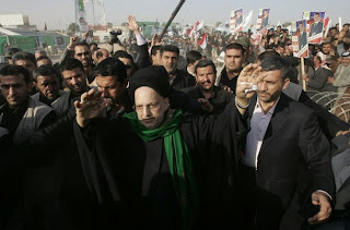Abdul-Aziz al-Hakim, leader of Shi'ite religious political party Islamic Supreme Council of Iraq (ISCI), waves to supporters during an election campaign rally in Najaf, south of Baghdad January 25, 2009. There are 14,431 candidates registered to contest just 440 council seats across Iraq for the coming January 31 provincial election. (c)2008 Reuters.