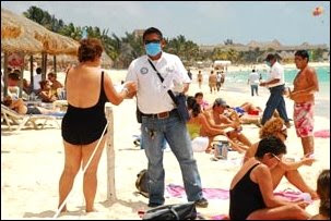 Masks and bikinis on the beach in the Riviera Maya