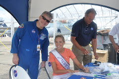 Astronaut Greg Johnson, Skip Williams, and Lauren sign autograghs