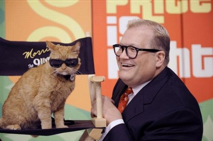 [famous_people_and_their_cats_35.jpg]