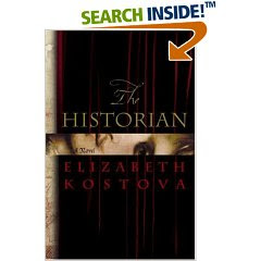 hardback cover of The Historian by Elizabeth Kostova: a dark cover with scrolled lettering