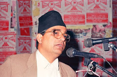 Com. Madan Bhandari