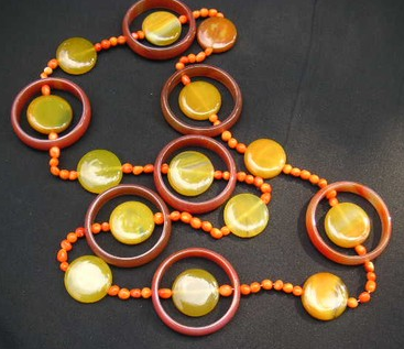 necklace made with orange and yellow stone beads