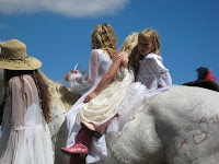 Girls riding horseback in Fourth of July Parade in Makawao, upcountry Maui Hawaii