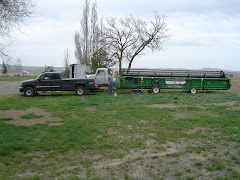Aaron using Truck to Move Combine Header