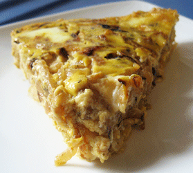 onion quiche with a brown rice crust and green eggs