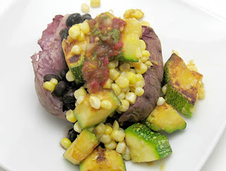 pink potato with smokin' black beans, heirloom tomato salsa, and sauteed zucchini and corn