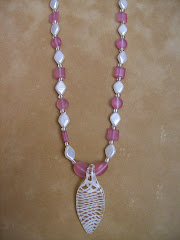 Pink and white blown glass pendant necklace