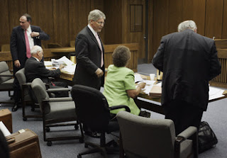 Nifong attorneys - Ann Petersen (second from right) and Jim Glover (right)