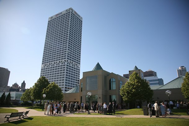 Ellie and John in the receiving line at the Harbor Lights room in downtown Milwaukee with US Bank building in the background