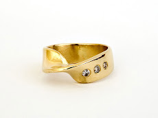 Mobius Strip ring with diamonds