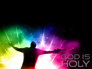God is holy with praying hands and colorful rainbow background in night effect image