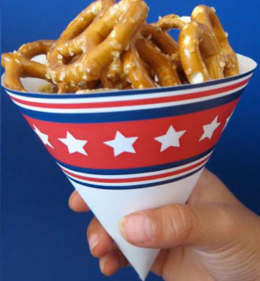 Paper snack cup with pretzels inside