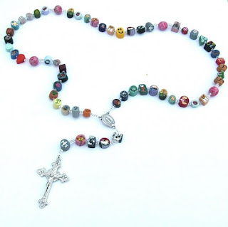 Clay rosary with silver cross and silver medallion