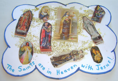 Cloud with gold glitter and pictures of Jesus and saints 