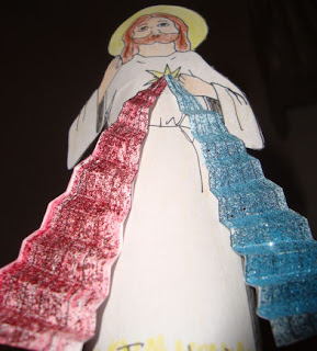 Paper standee of Jesue with the rays of the Divine Mercy 