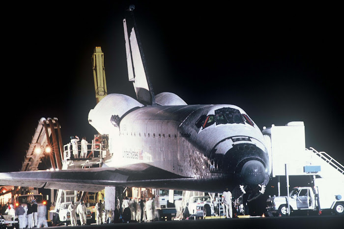 Space Shuttle Columbia, makes a night landing at Edwards AFB, California