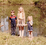 Our kids by the pond