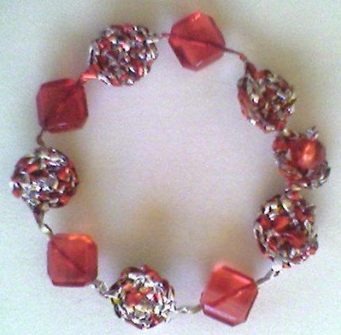 [pulseira+vermelha.jpg]