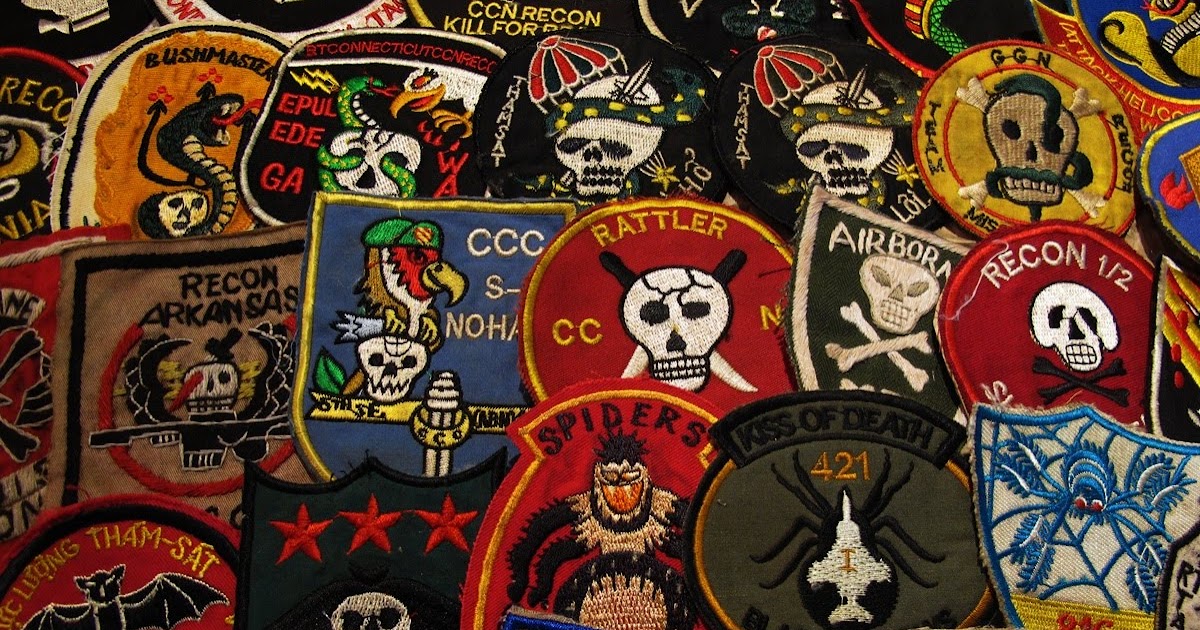 Mili through patches of violet. Military patch.