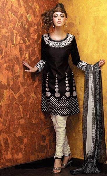 This is graceful black and cream churidar pajama suit with embroidery and 