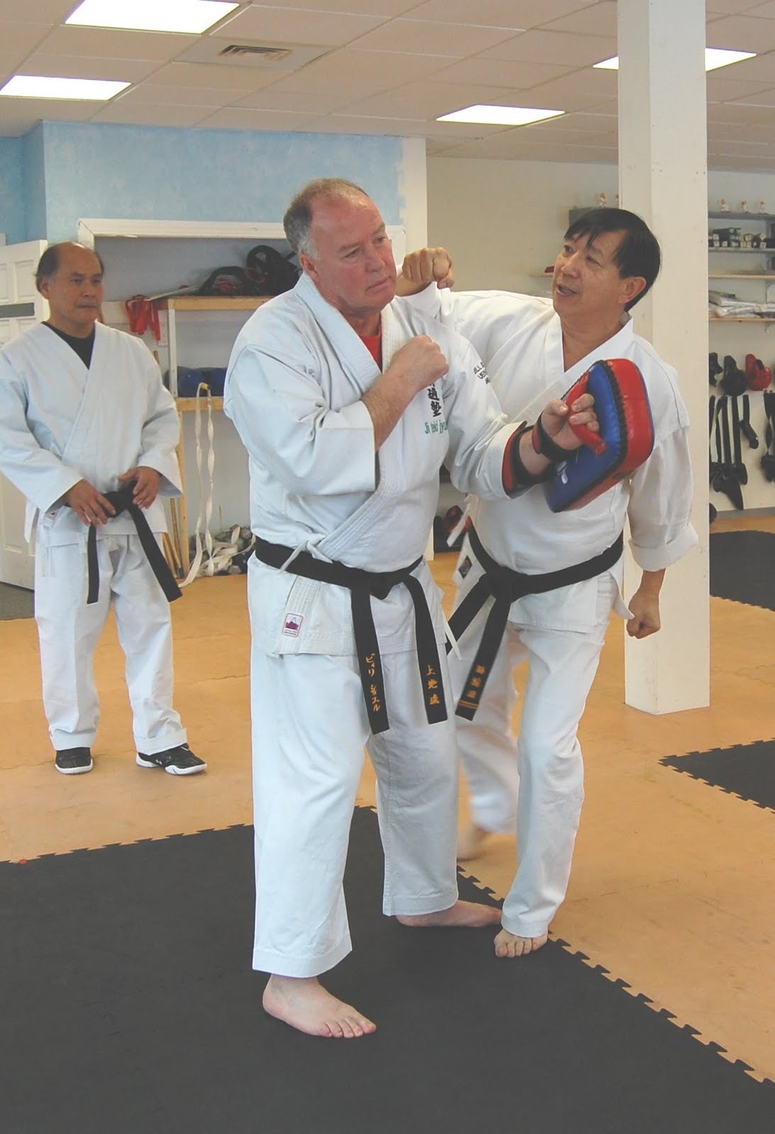 Budokan Martial Arts Sensei Yee with Advance Black Belt students Tom Hallahan, Henry Tow, Sam