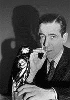 Humphrey Bogart as Sam Spade in The Maltese Falcon, book by Dashiell Hammett