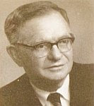 A black and white photo of Dr. David Diringer.
