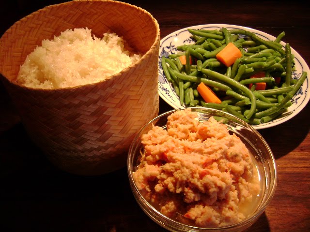 Sticky or glutinous rice, Boiled fresh white water  fish, lemon grass,salt fish sauce,spring onions