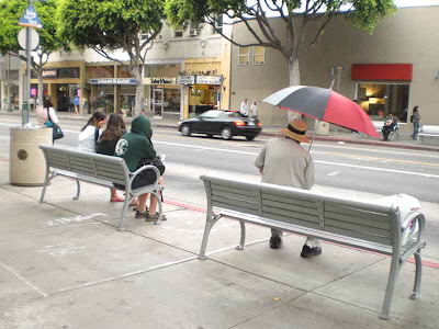 An Umbrella and A Hat is like A Belt and Suspenders