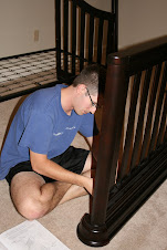Jared assembling Hadley's bed