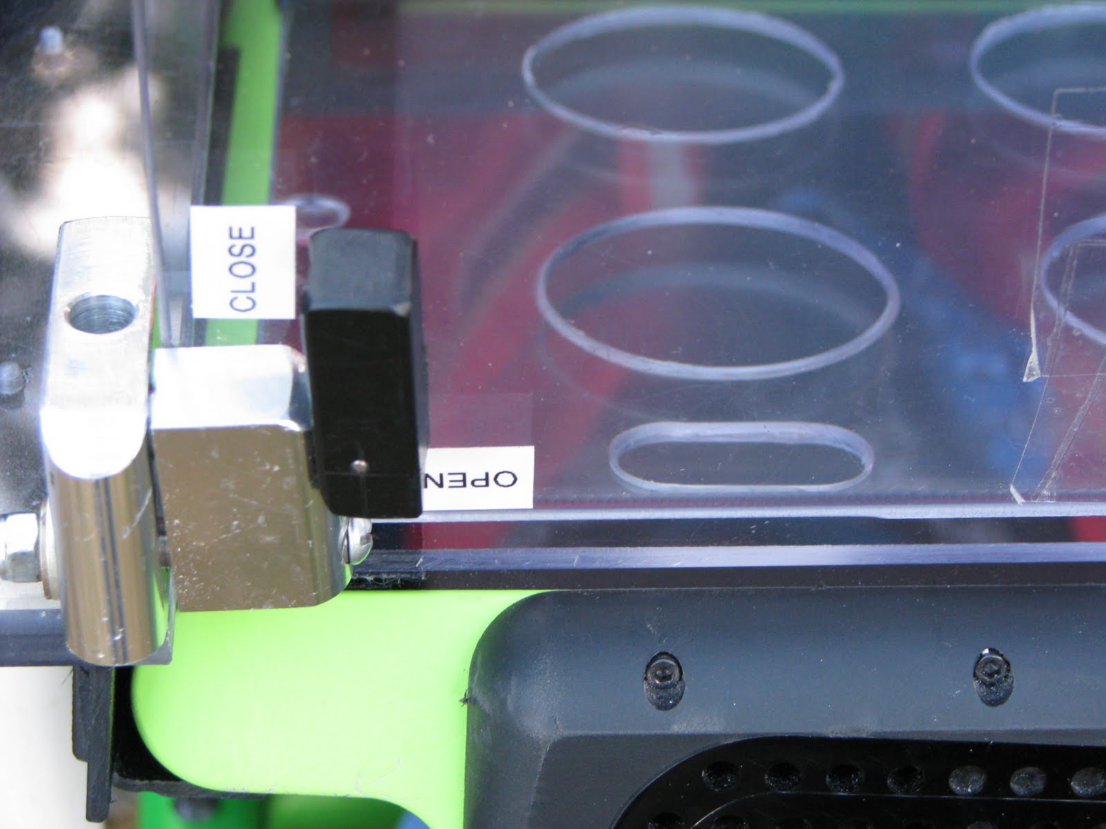 Mothers of Invention Custom Wheelchair Tray Adaptations for Dynavox