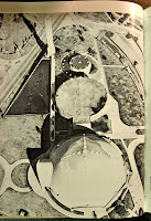 Aerial view showing the complex and reflection pool.