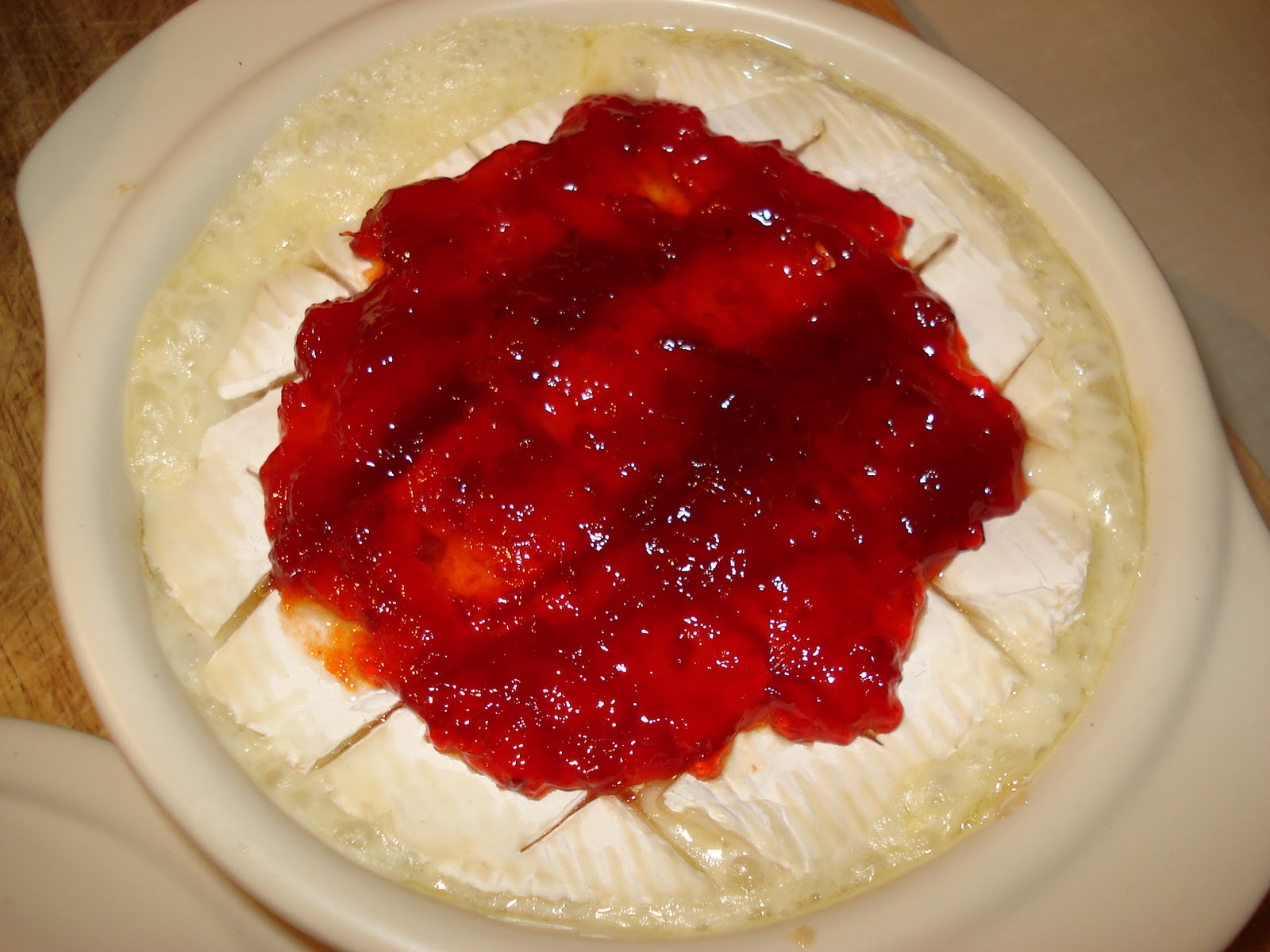 For the love, and lovers, of food. Baked Brie with Red Pepper Jelly.
